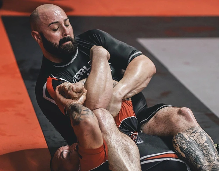 Adults training Brazilian Jiu Jitsu at Peerless in Corona, CA